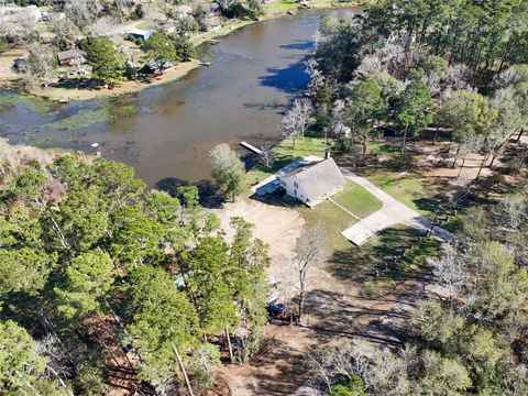 Photo of 10482 Lake Shore Drive, Conroe, TX 77303 (MLS # 34626292)