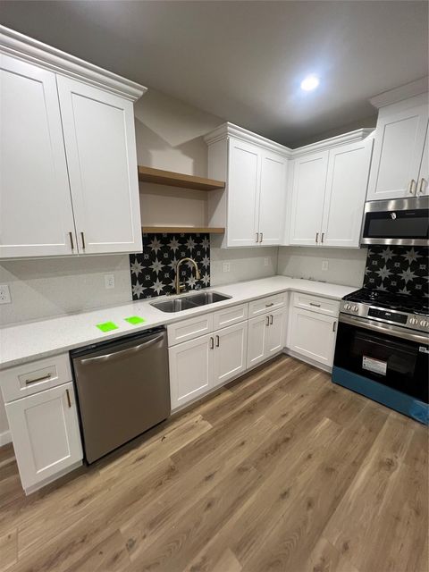 Photo of 5325 Kenilwood Drive #AB, Houston, TX 77033 (MLS # 24509933)