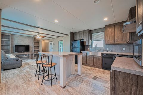 Photo of 1122 Road 57221, Cleveland, TX 77327 (MLS # 79269677)