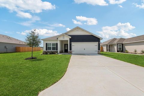 Photo of 10351 Red Cardinal Drive, Cleveland, TX 77328 (MLS # 36932064)