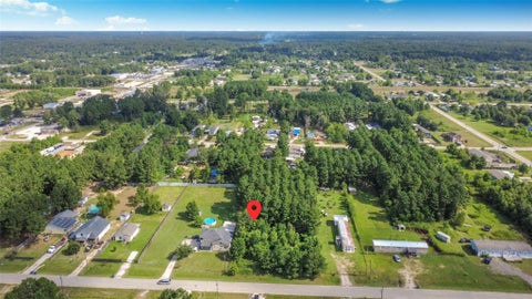 Photo of 169 County Road 3560, Cleveland, TX 77327 (MLS # 74131852)