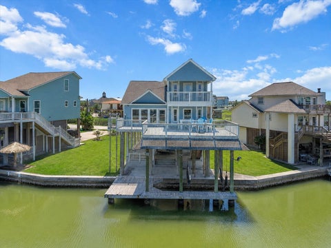 Photo of 314 Windward Way, Tiki Island, TX 77554 (MLS # 43830175)