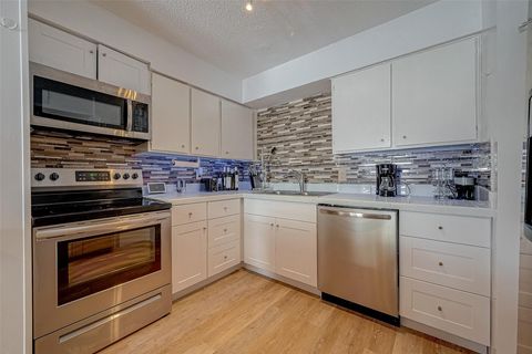 Photo of 12042 Mighty Oak Drive #B, Houston, TX 77066 (MLS # 15374095)