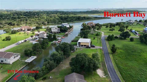 Photo of 211 Rue Orleans Street, Baytown, TX 77520 (MLS # 49658684)