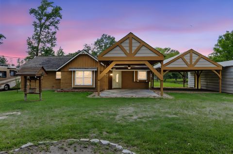 Photo of 6742 Dusty Lane, Conroe, TX 77306 (MLS # 22191075)