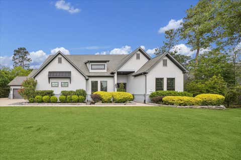 Photo of 30943 Spring Lake Blvd Blvd, Tomball, TX 77375 (MLS # 87895850)