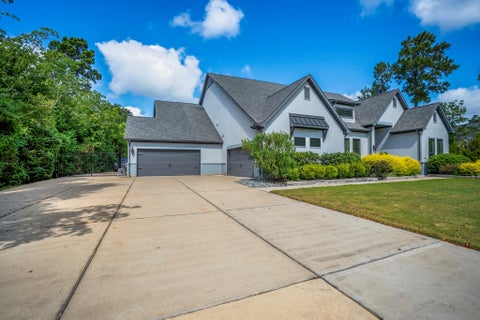 Photo of 30943 Spring Lake Blvd Blvd, Tomball, TX 77375 (MLS # 87895850)