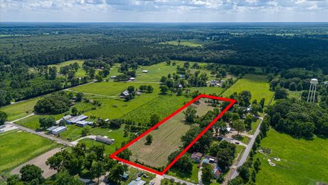 Photo of 0 County Road 2060, Hull, TX 77564 (MLS # 79158950)