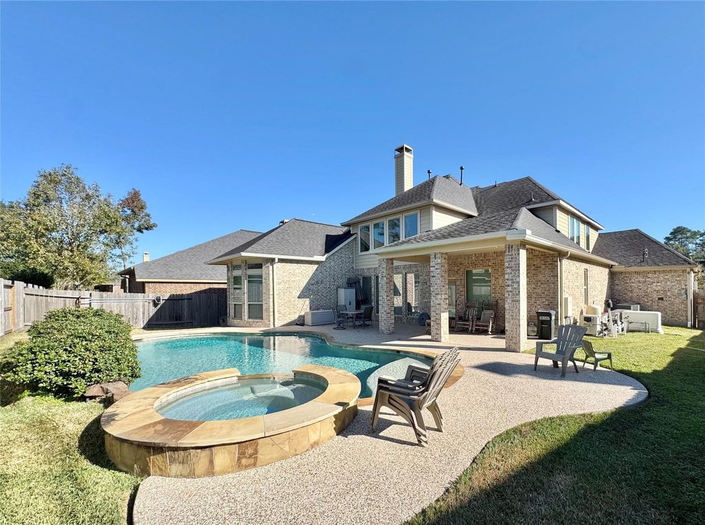 Photo of 13626 Breakwater Path Loop, Houston, TX 77044 (MLS # 40342097)