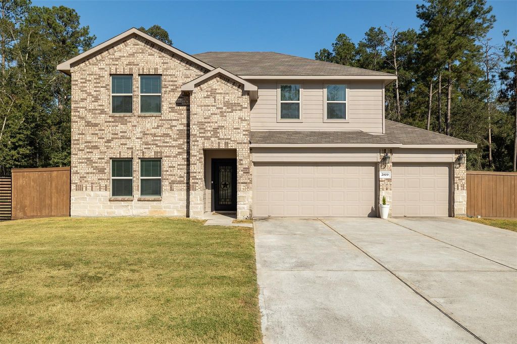 Photo of 2819 Roman Forest Boulevard, New Caney, TX 77357 (MLS # 33545754)