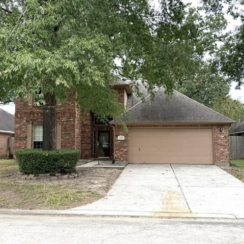 Photo of 2203 Blossom Creek Trail, Houston, TX 77339 (MLS # 21429488)
