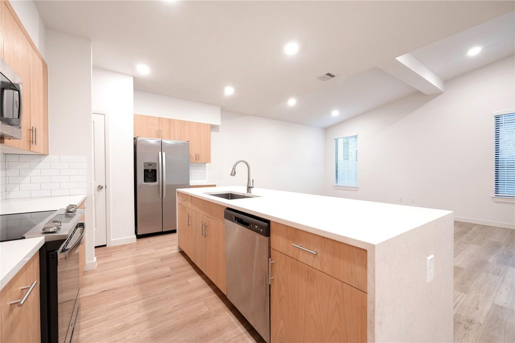 Photo of 2515 Appian Way Way #B, Roman Forest, TX 77357 (MLS # 91565851)