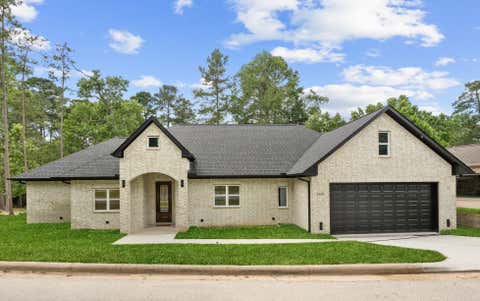 Photo of 1920 Foxbriar Drive, Huntsville, TX 77340 (MLS # 28471358)