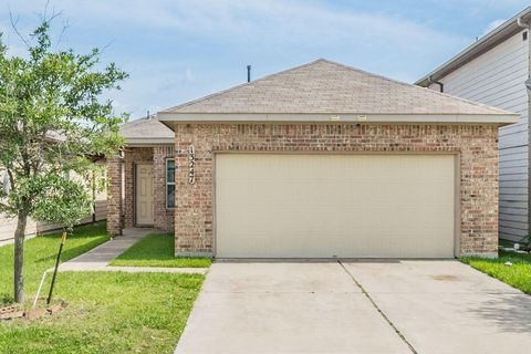 Photo of 13247 Montane Manor Ln LN, Houston, TX 77044 (MLS # 94622136)