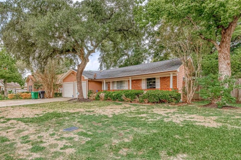 Photo of 7022 Triola Lane, Houston, TX 77074 (MLS # 21297375)