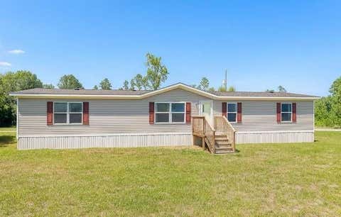 Homes For Sale - 1656 County Road 3479a<br/> Cleveland, TX 77327