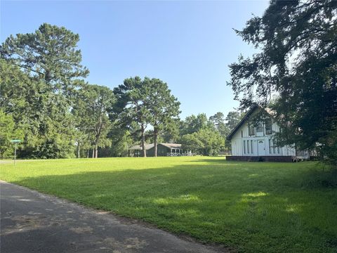 Photo of 701 Mockingbird Hills, Livingston, TX 77351 (MLS # 97364826)