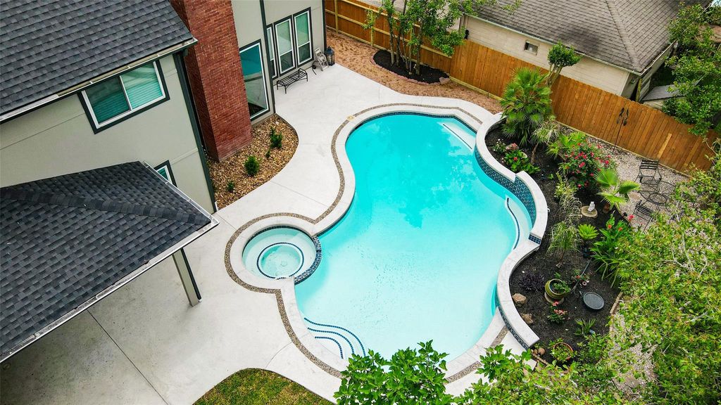 Photo of 5807 Mountain View Drive, Houston, TX 77345 (MLS # 61710036)