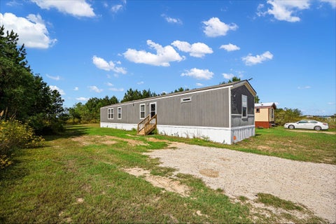 Photo of 281 Road 5703, Cleveland, TX 77327 (MLS # 31379951)