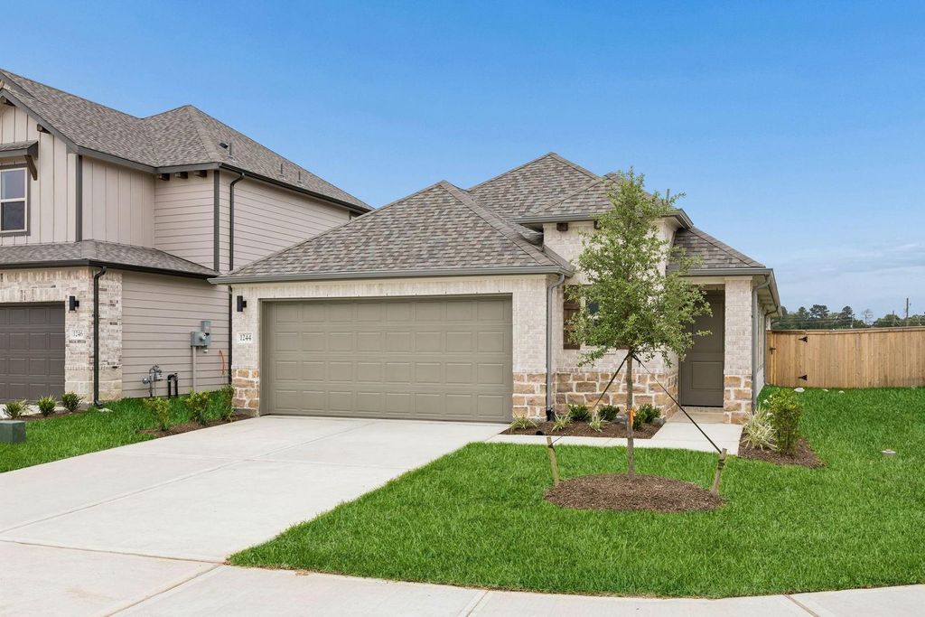 Photo of 1244 Minorca Street, Huffman, TX 77336 (MLS # 21674423)