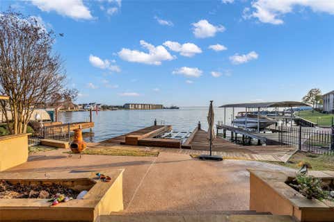 Photo of 7159 Kingston Cove Lane, Willis, TX 77318 (MLS # 97494185)