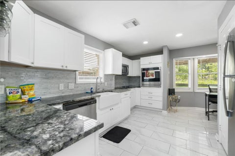 Photo of 11714 Fallwood Drive, Houston, TX 77065 (MLS # 71391622)