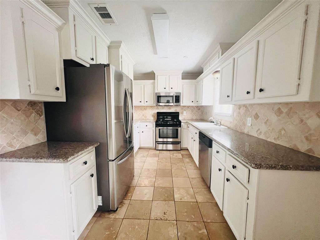 Photo of 1910 Huge Oaks Street, Houston, TX 77055 (MLS # 10202400)