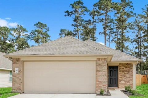 Photo of 302 Blue Crane Street, Huntsville, TX 77320 (MLS # 85398526)