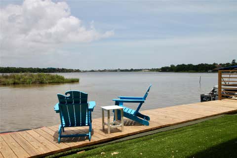Photo of 25 Cmdr Runco Lane, Taylor Lake Village, TX 77586 (MLS # 86874145)