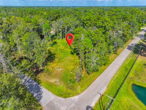 Photo of 11855 Magnolia Bend Dr Dr, Conroe, TX 77302 (MLS # 91408611)