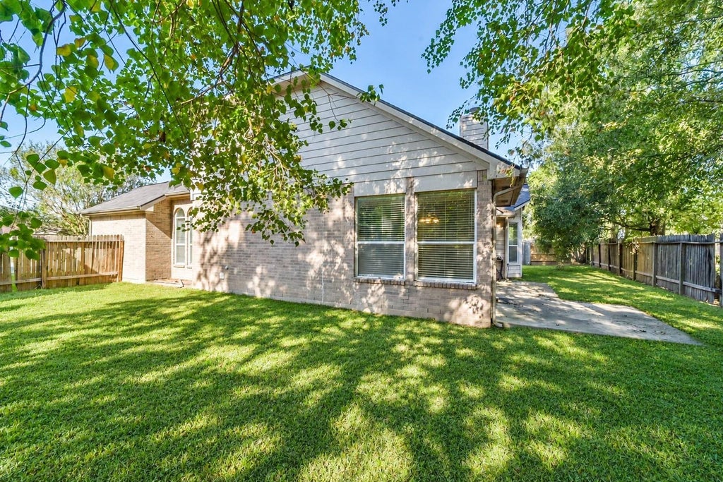 Photo of 440 Mystic Trail Loop, Kingwood, TX 77339 (MLS # 76734681)