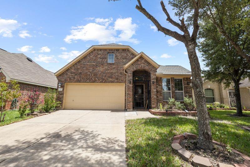 Photo of 12610 Redbud Villa Lane, Houston, TX 77086 (MLS # 86420755)