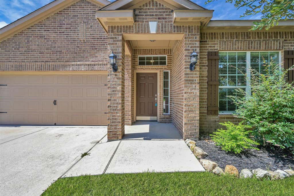 Photo of 30719 W Lost Creek Boulevard, Magnolia, TX 77355 (MLS # 71518705)