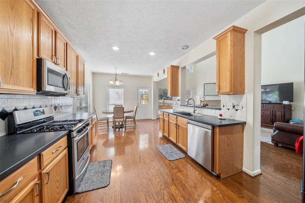 Photo of 8402 Hunters Village Drive, Humble, TX 77346 (MLS # 90132517)