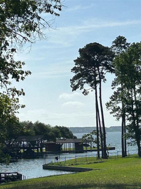 Photo of TBD Knottypine Rd, Livingston, TX 77351 (MLS # 9501396)