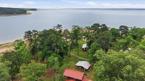 Photo of 3129 County Road 4750, Broaddus, TX 75929 (MLS # 10471309)