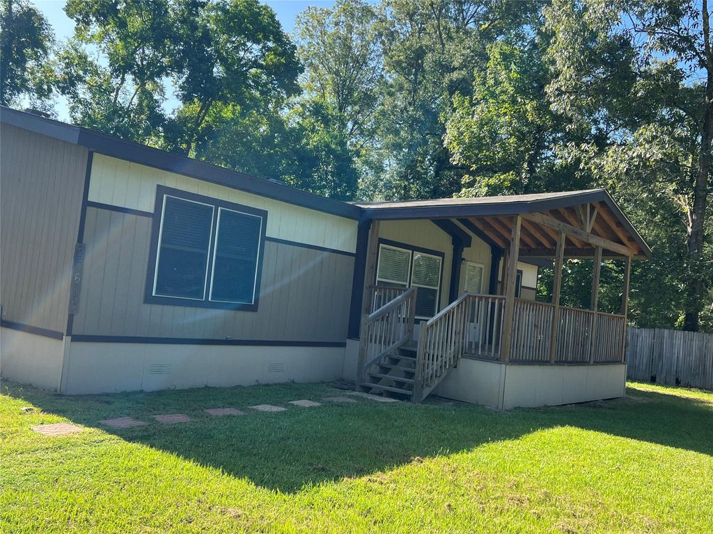 Photo of 20215 Lazy Creek Drive, New Caney, TX 77357 (MLS # 55632444)