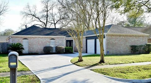 Photo of 13723 Ella Lee Lane, Houston, TX 77077 (MLS # 65256412)