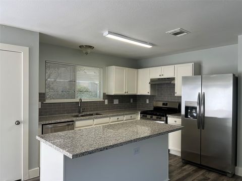 Photo of 11956 Chanteloup Drive, Houston, TX 77047 (MLS # 74924980)