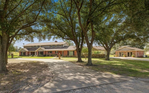 Photo of 1427 Old Mill Lane, Madisonville, TX 77864 (MLS # 97025890)