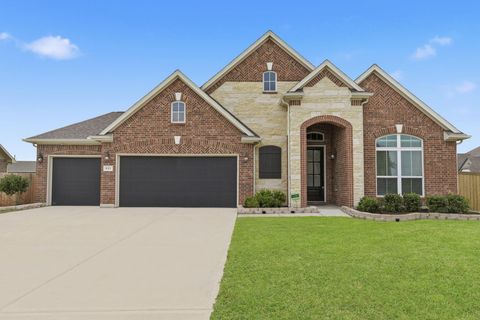 Photo of 9311 Secretariat Lane, Mont Belvieu, TX 77523 (MLS # 21595590)