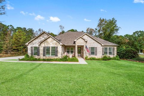 Photo of 6802 W Bluff Drive, Magnolia, TX 77354 (MLS # 94554408)