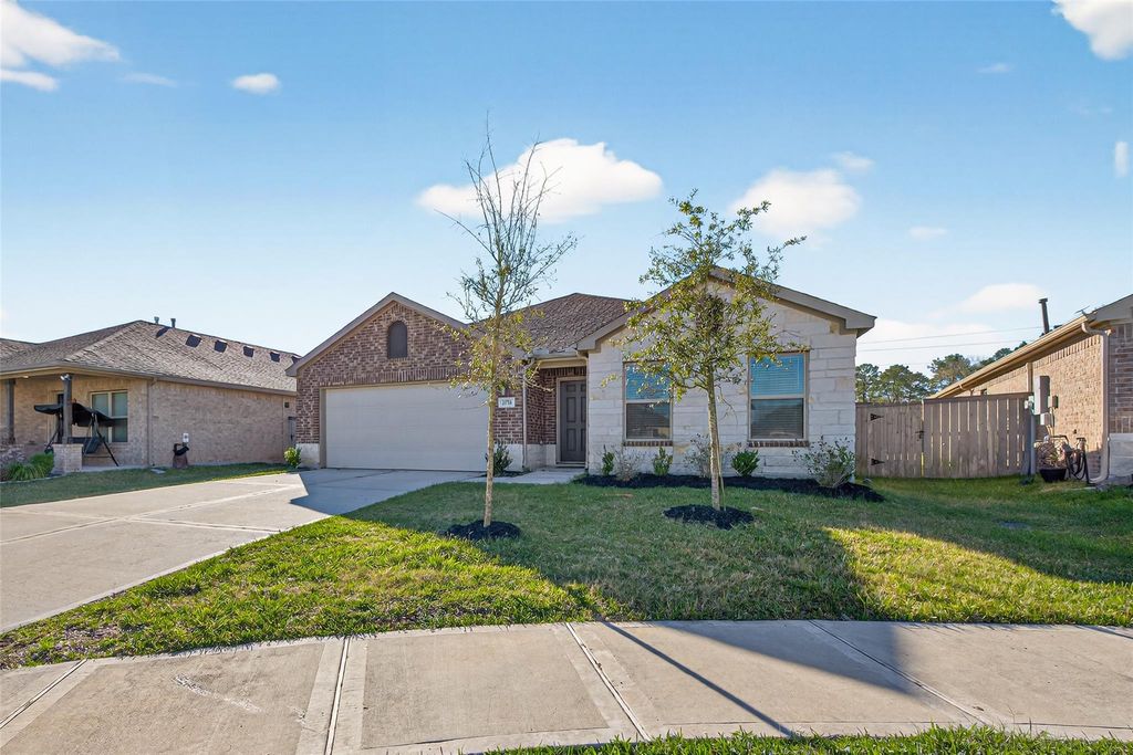 Photo of 20706 Southern Woods Drive, New Caney, TX 77357 (MLS # 34152067)