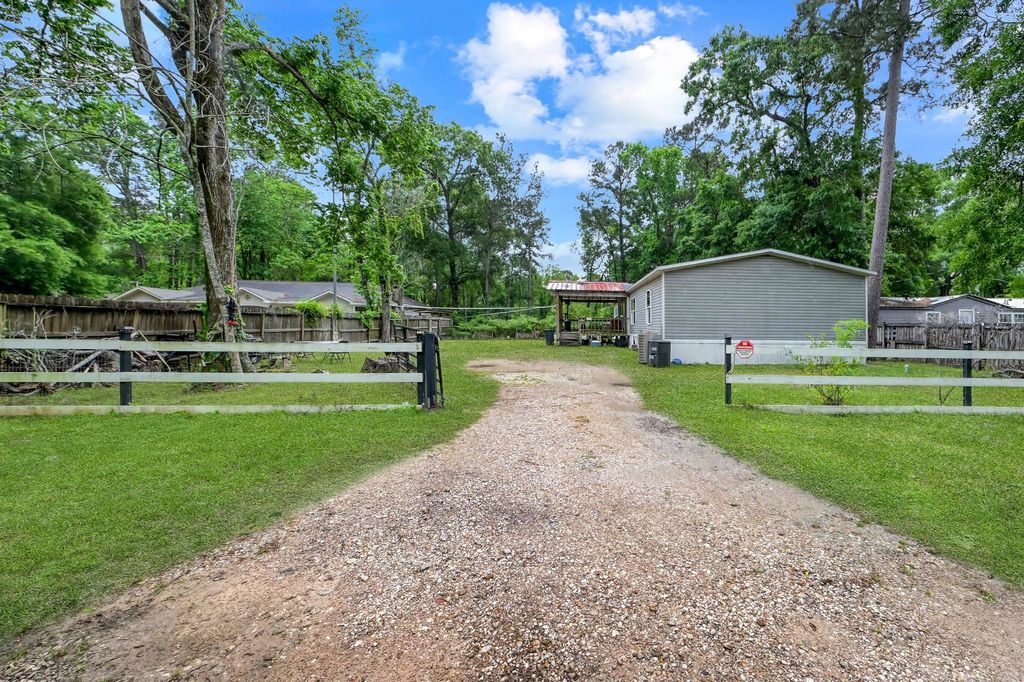 Photo of 23594 Pine Forest Drive, New Caney, TX 77357 (MLS # 28620487)