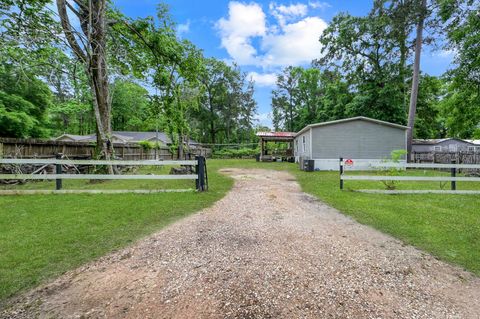 Photo of 23594 Pine Forest Drive, New Caney, TX 77357 (MLS # 28620487)