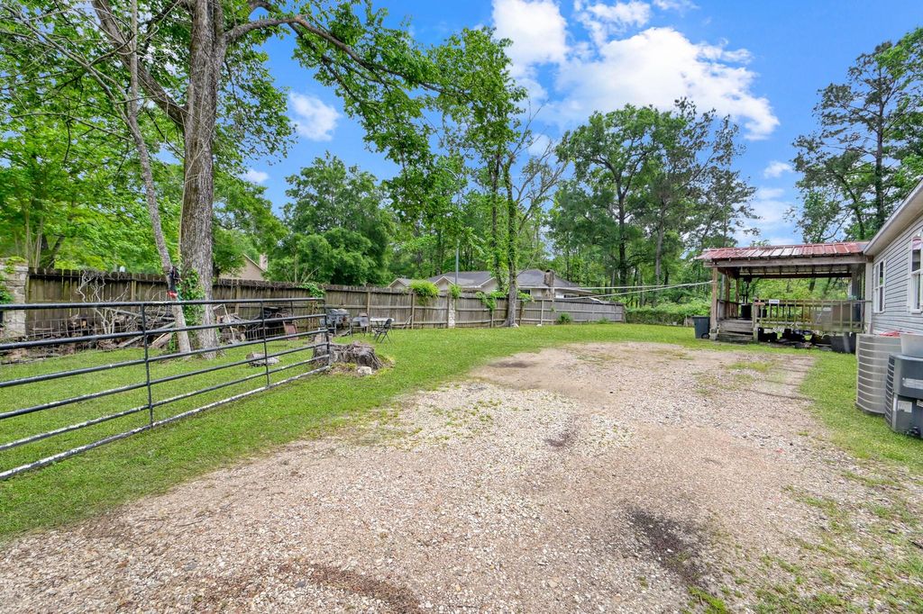 Photo of 23594 Pine Forest Drive, New Caney, TX 77357 (MLS # 28620487)