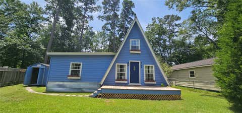 Photo of 9785 Black Gum, Willis, TX 77318 (MLS # 45647516)