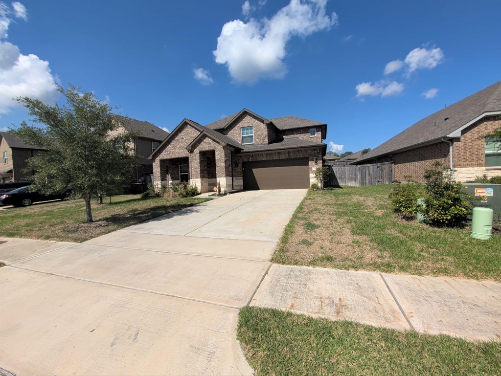 Photo of 1911 Canyon Live Oak Street, Conroe, TX 77304 (MLS # 36928540)