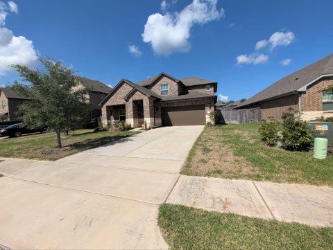 Photo of 1911 Canyon Live Oak Street, Conroe, TX 77304 (MLS # 36928540)