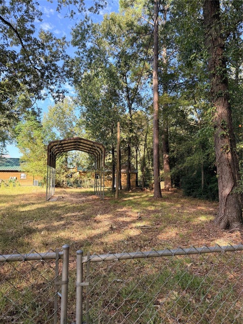 Photo of 155 Lost Oak, Livingston, TX 77351 (MLS # 94740585)
